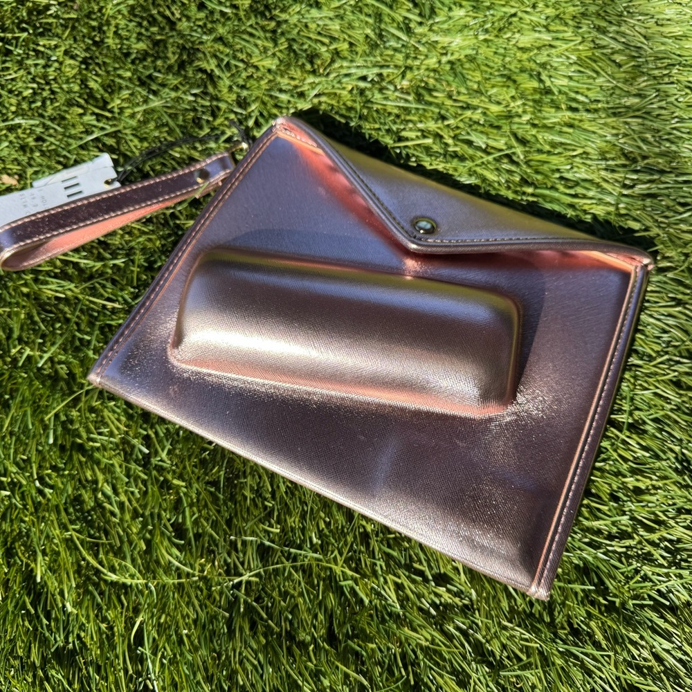 Metallic Rosé Slim Can Clutch with Wristlet. New